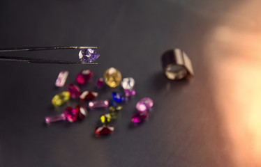 Jewel or gems on black shine color, Studio shot of beautiful gem