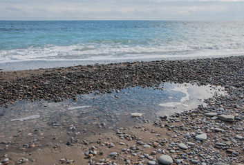 colorful pebbles on the beach in high quality