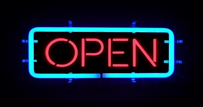flickering blinking blue neon sign on black background, open shop bar sign concept