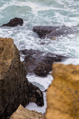 atlantic coastline with surfes in cloudy day