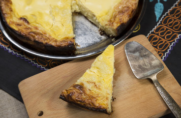 Pies of cheese and sliced.