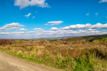 Beautiful view to autumn valley with field and forest in Slovakia, November
