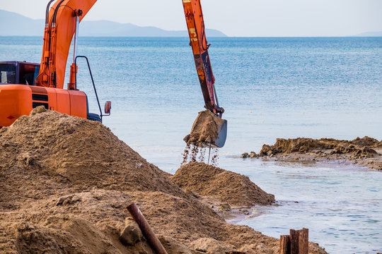 Excavator On The Reclamation Land.