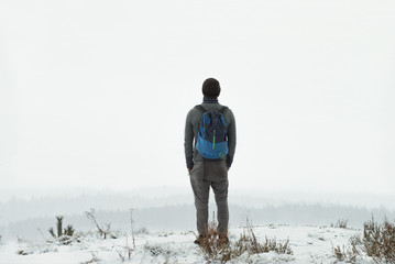 man on a hill