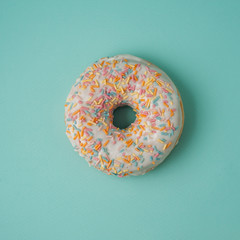 white donut on a blue background