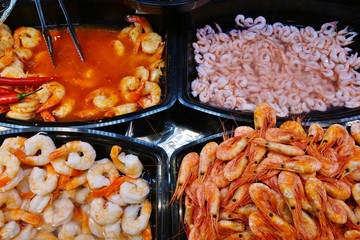 Assorted fresh and marinated shrimp dishes in Scandinavia
