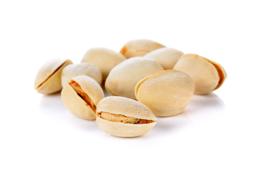 Toasted Pistachios On A White Background