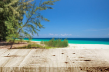 Empty wooden table on the beach