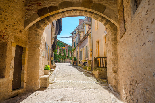Narrow street in the old town Bourbon Lancy, France