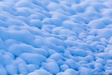 blue snow in the morning as a background