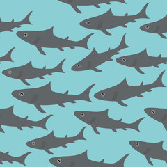 Seamless pattern with gray sharks on light blue background. Vector