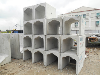 U-Shape precast concrete drain stored at the construction site.
