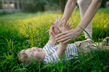 Boy lying on grass