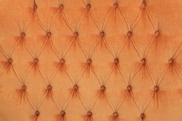 Buttoned on the brown Texture from sofa