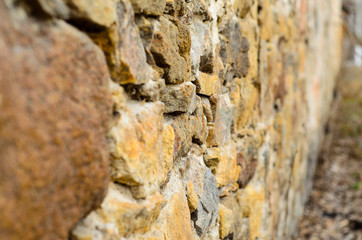 Stone wall background. Selective focus