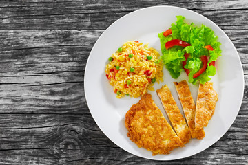 Crispy Southern Fried Pork Chops with risotto and fresh salad