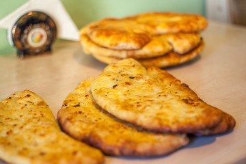 khachapuri (ghvezeli) in a half moon form for christmas day, Geo