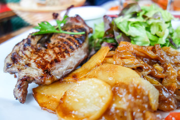 juicy steak beef meat with tomato and potatoes