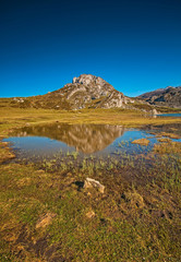 Beautiful mountain landscape with small lake in Picos de Europa, Spain