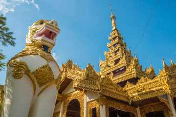 The traditional Burmese lion in front of Kanbawzathadi Palace in Bago. The original palace, built...