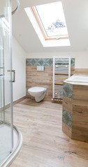 Modern bathroom interior with wood and blue pattern tile