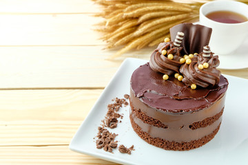 chocolate cake on wooden background