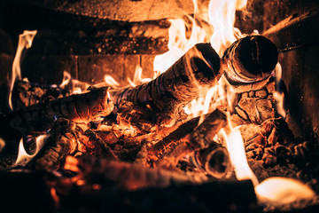 firewood burning in a fireplace