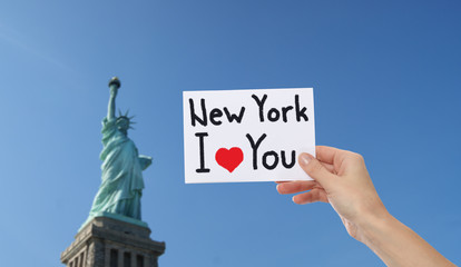 New York I love You on paper in girl hand. Turistic and travel concept.