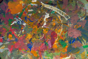 Artistic palette with color water and oils paints