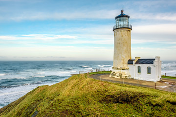 Fototapeta na wymiar North Head Lighthouse at Pacific coast, built in 1898