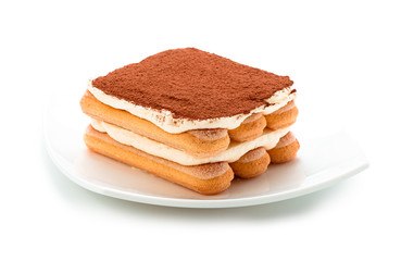 Tiramisu on white plate isolated. Clipping path.