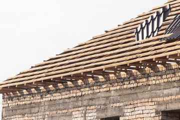 being built roof of the house