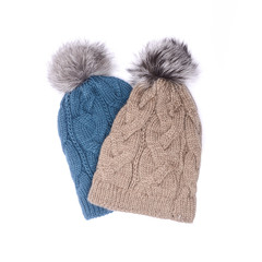 Two knitted hats isolated on white