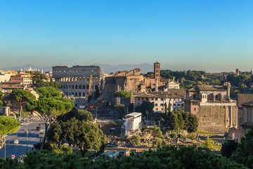 Fototapeta na wymiar Rome, Italy. View Colosseum and Roman Forum from Capitol Hill 