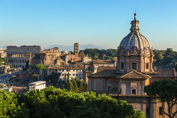 Naklejka na ściany i meble Rome, Italy. View from Capitol Hill: the Colosseum, the Roman Forum, the church of Santi Luca e Martina,