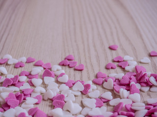 Pink and white candy hearts background.