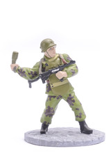 Tin Soldier throws grenade isolated on white