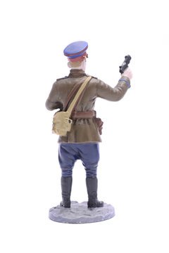 Tin Soldier with a gun and binoculars isolated on white