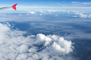 Fototapeta premium Above the clouds.Wing aircraft on the sky