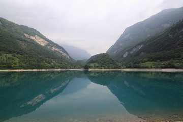 Fototapeta na wymiar Blue mountain lake Tenno in Italy at summer