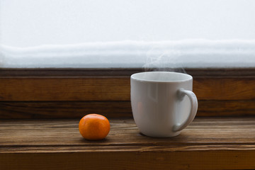 White cup with orange
