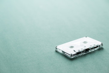 retro audio formats. Compact Cassette on the aqua background