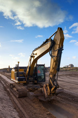 grue et son godet trap&egrave;ze