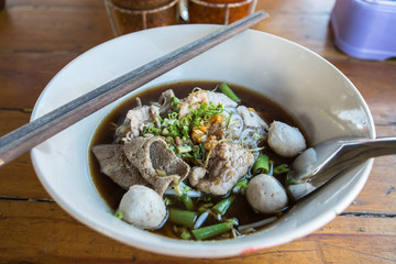 Close-up of boat Noodles with Pork (Kuay Tiew Moo Nam Tok)
