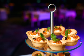 canapes of caviar on a table in a restaurant