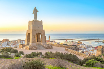 Statue of Christ staying above the Almeria city