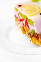 Piece of jelly fruit cake with milk