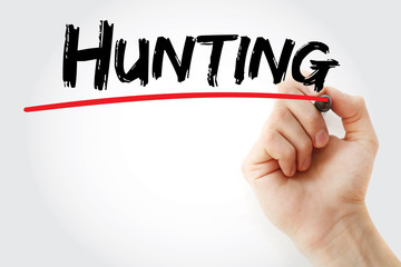 Hand writing Hunting with marker, concept background