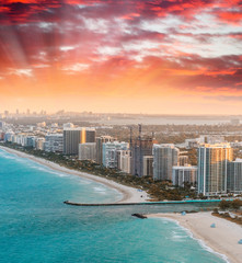 Fototapeta premium Sunset view of Miami from helicopter