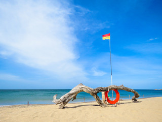 Red and Yellow lifeguard warning flag on the Beach